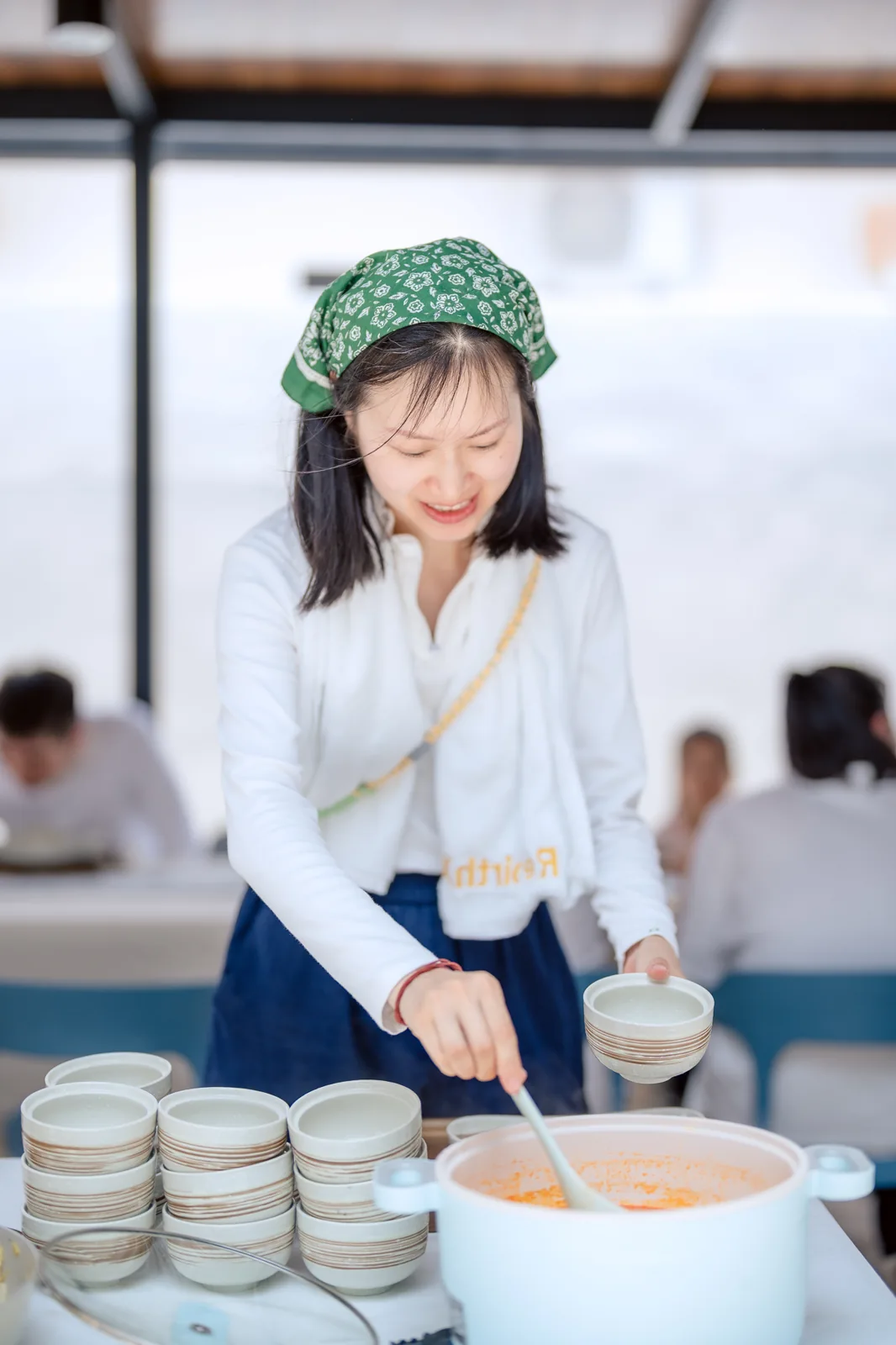 A participant serving food