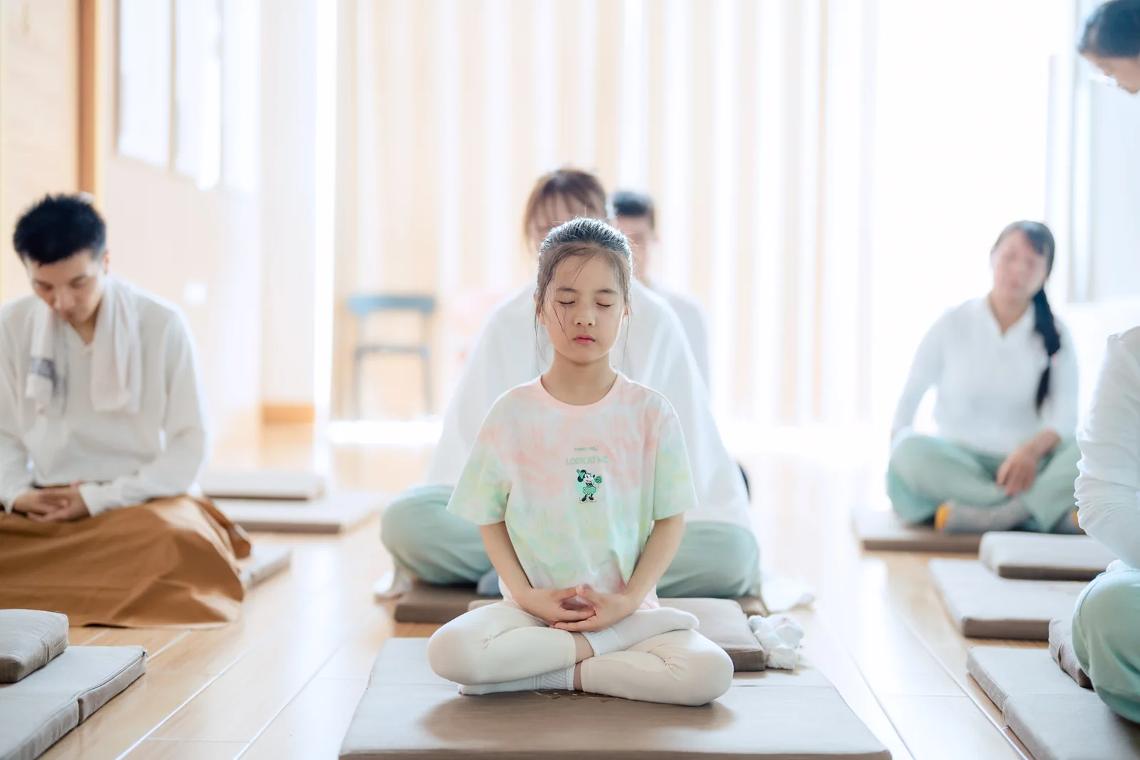Seated practice in the light-filled room