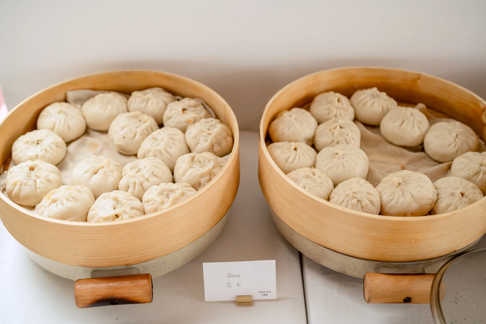 Steamed buns in bamboo baskets